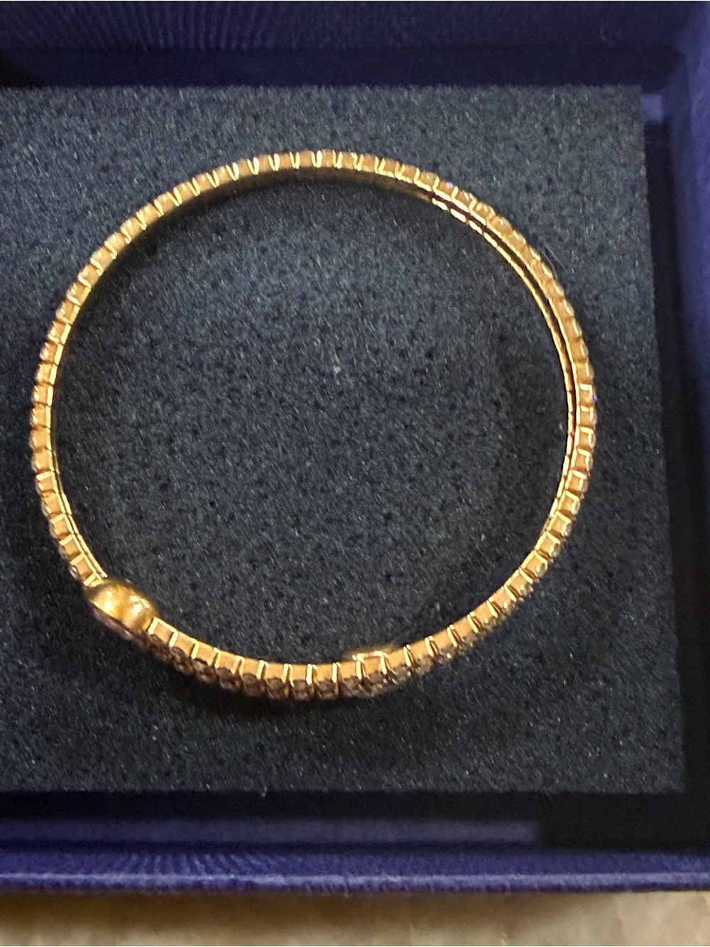 Swarovski gold-tone Twisty Drop double-wrap bangle - Picture 3 of 6